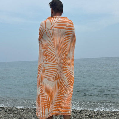 Sisustusviltti, torkkupeitto ja jättipyyhe  – Oranssi viltti terassille ja piknikille (140x170 cm) - Monikäyttöinen ja kevyt pyyhe toimii reissukumppanina ja kodin sekä terassin sisustamiseen.